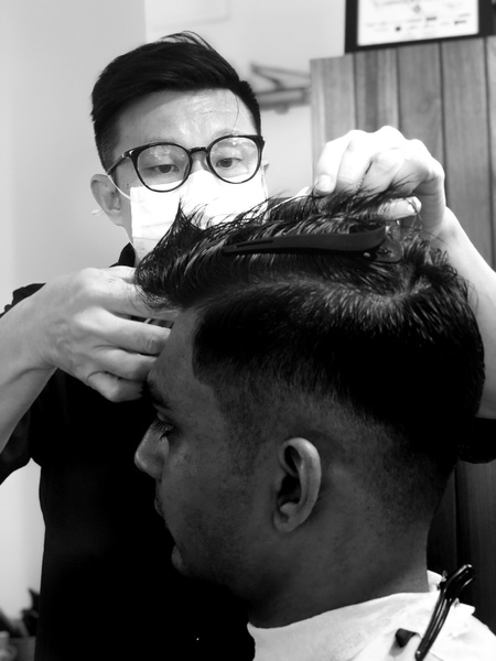 Tian - Junior Barber. 