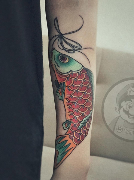 "Koinobori - lễ hội lồng đèn cá chép Trong tiếng Nhật, “Koi” có nghĩa là cá chép còn “nobori” là tượng trưng cho hình ảnh những chú cá bơi ngược dòng từ dưới lòng sông lên thác." Đây cũng là hình tượng đại diện cho "ước mơ thủa bé của mỗi người" và hình xăm cũng là động lực cho ước mơ của bạn khách